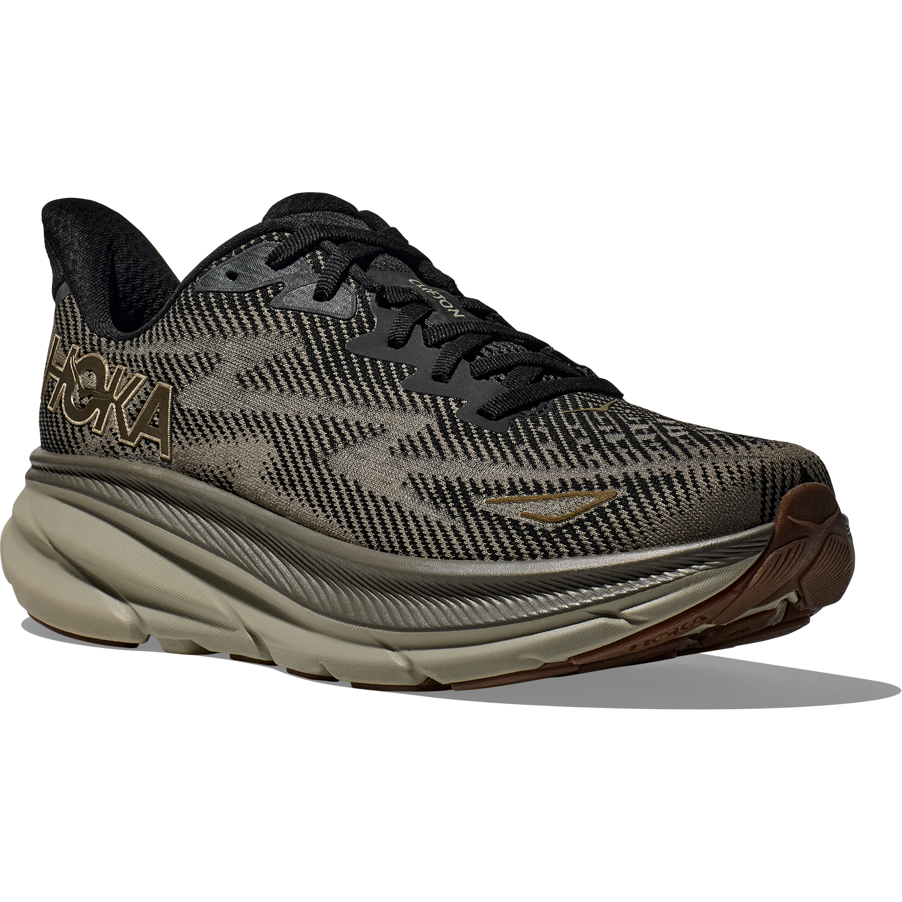 A black and gray athletic shoe with a thick, protective cushion beige sole, black laces, and the brand logo "Hoka M Clifton 9, Black/Slate" on the side.