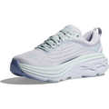 A light grey Hoka W Bondi 8, Ether/Illusion athletic shoe with a thick, cushioned white sole and light green laces. The shoe features a woven texture, softer lighter foams for an enhanced soft ride, and a loop on the heel.