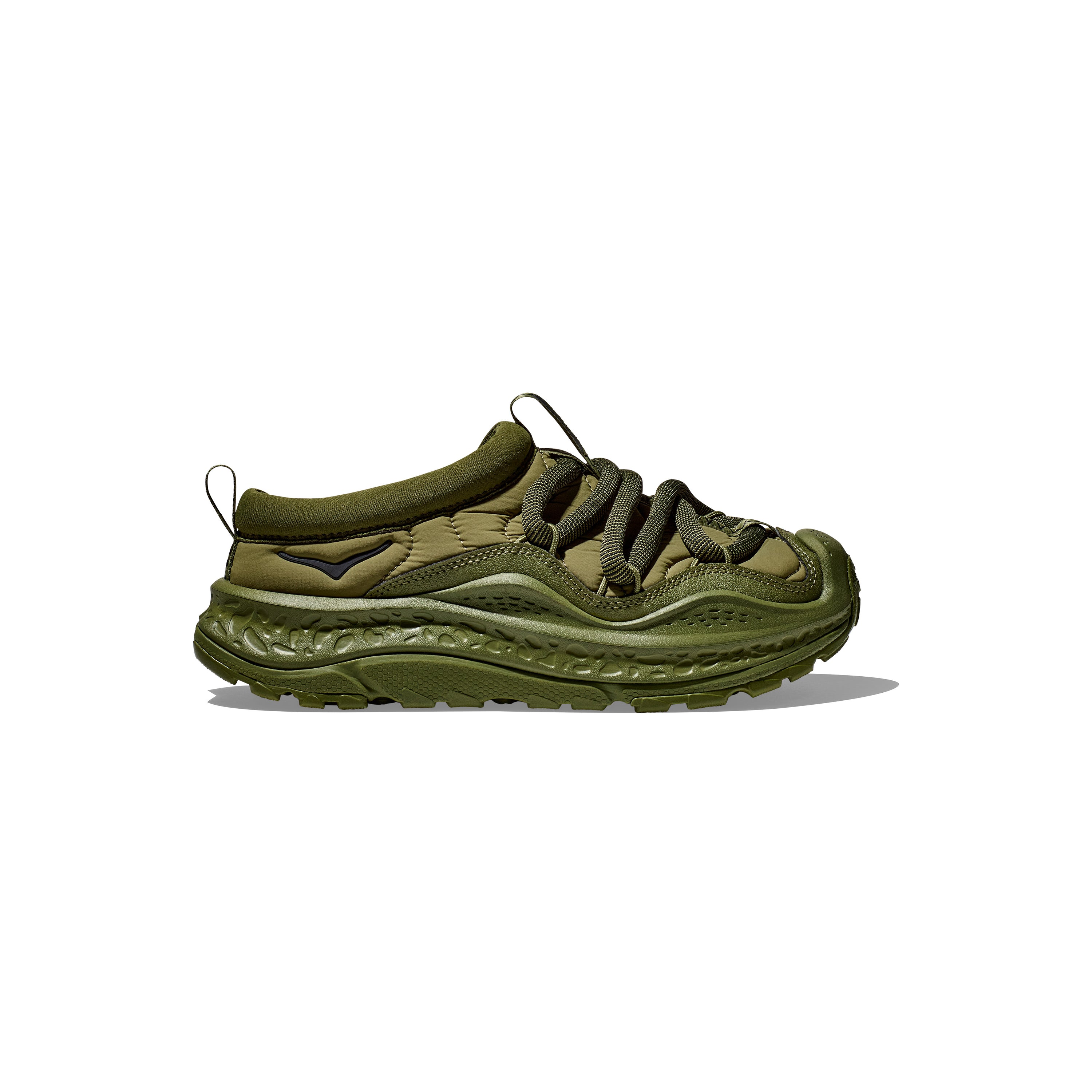 The Hoka U Ora Primo in olive green features a rugged sole, black laces, and fabric loops, ideal for those seeking slip-on comfort and effortless recovery.