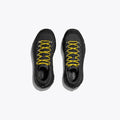 A top-down view of Hoka's U Tor Summit in black with standout yellow laces and metal eyelets against a white background.