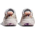 Rear view of a pair of white sneakers with colorful floral embroidery and textured soles, displayed against a plain background, offering a lightweight ride reminiscent of the Hoka W Clifton L BP, Nimbus Cloud/Nimbus Cloud.