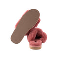 Lovisa Slipper in Marsala by Shepherd of Sweden, crafted in a fluffy style similar to cozy sheepskin slippers, one upright showing its textured sole while the other is tilted to reveal the plush top.