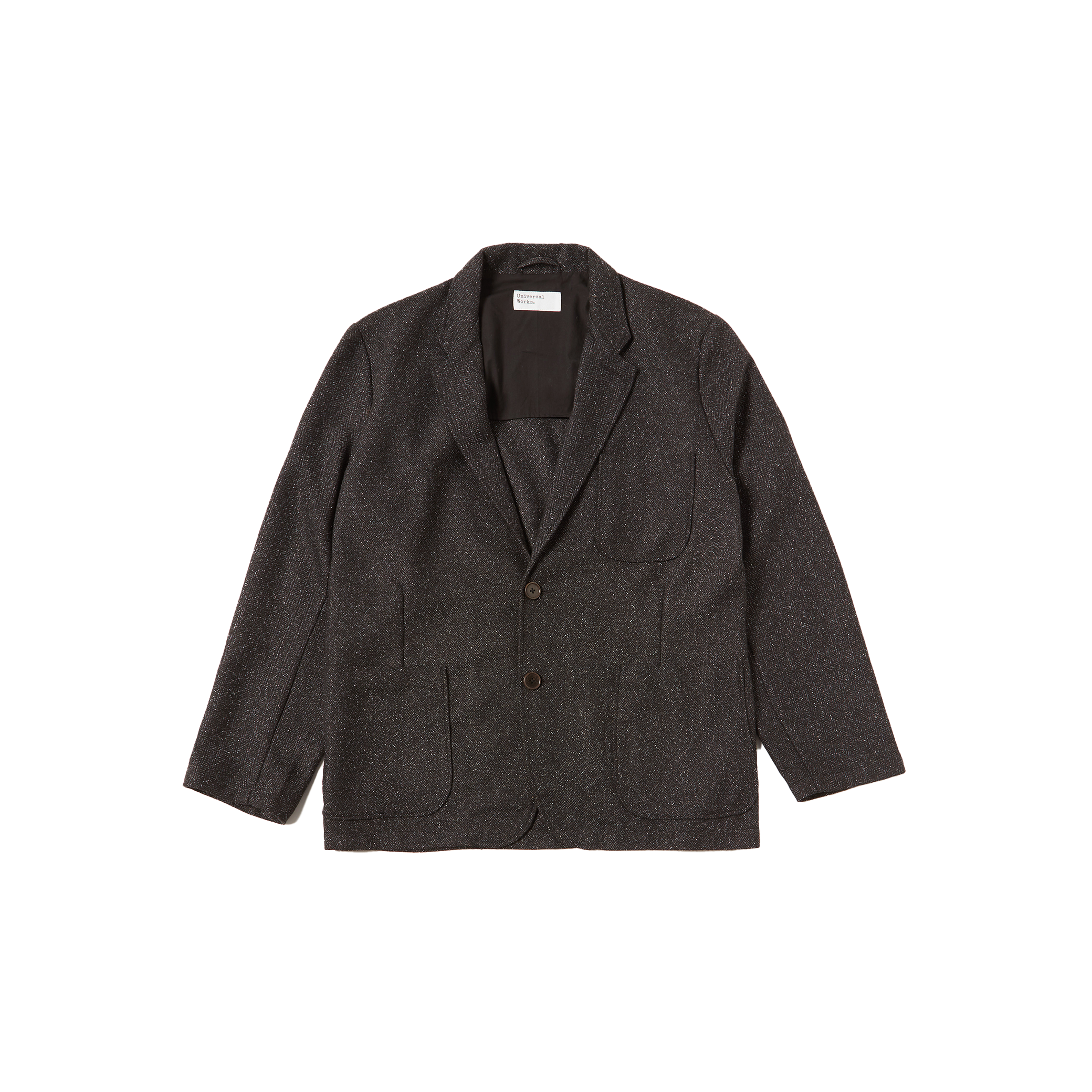 The Universal Works 2 Button Jacket is a sleek dark gray blazer with dual buttons and front pockets, elegantly displayed on a white background.