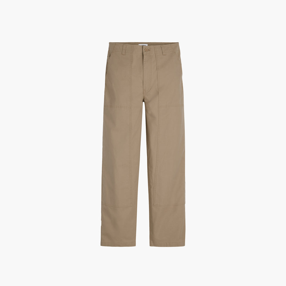 The Dockers Genderless 86 Utility Pant showcases a vintage style with a classic straight-leg cut made from recycled cotton, front pockets, and a button closure, blending style and sustainability.