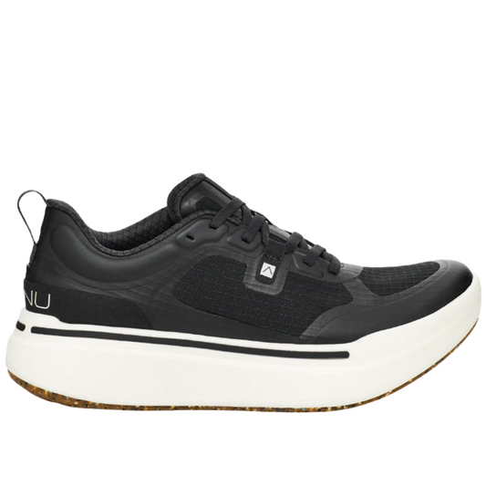 The AHNU W Sequence Low in Black is an athletic shoe featuring a streamlined silhouette, a lace-up design, and a thick white PEBA foam sole. It also includes a handy pull tab on the heel, making it perfect for daily wear.