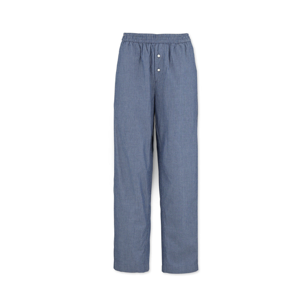 The Letto Casual Pant by Aiayu is made from Organic Chetna Cotton and features a menswear-inspired look with its blue and white stripes, elastic waistband, and button closure.