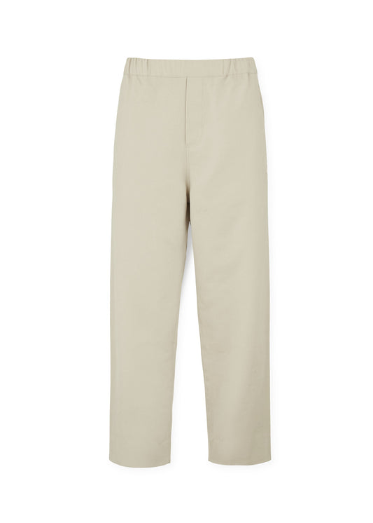 Coco Pant Tailored Velvet by Aiayu offers beige pants with an elastic waistband and straight-leg design, crafted from luxurious velvet cotton twill.