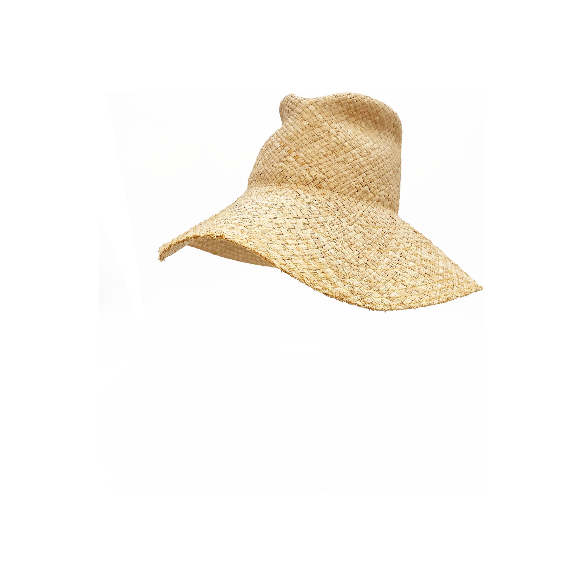A wide-brimmed Commando raffia straw hat isolated on a white background by Lola Hats.