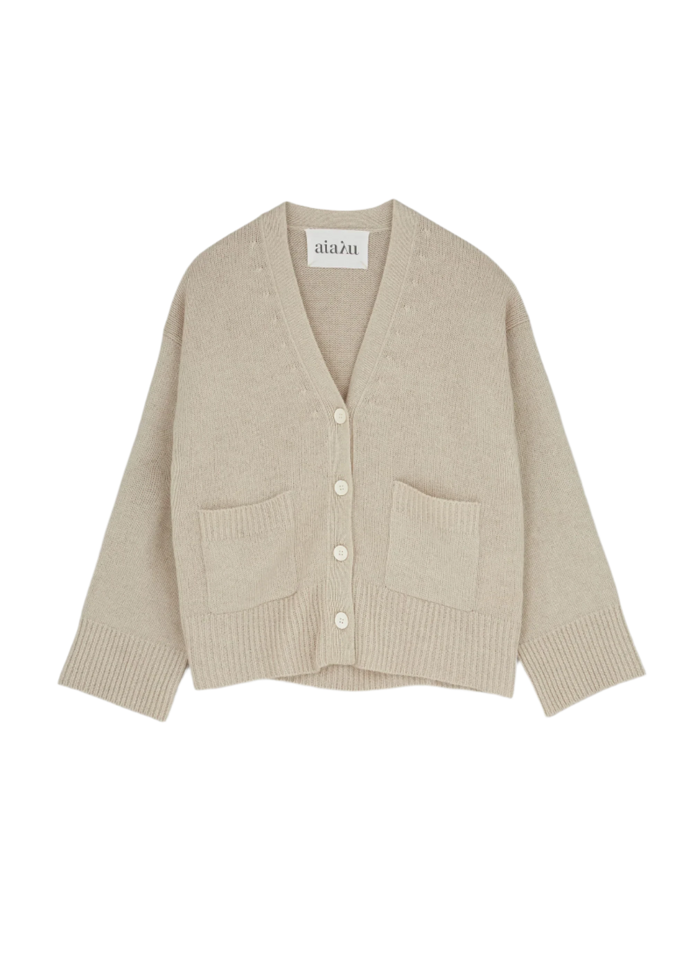 The Cora Cardigan by Aiayu is a beige, V-neck, button-up sweater featuring long sleeves, two front pockets, and ribbed cuffs.