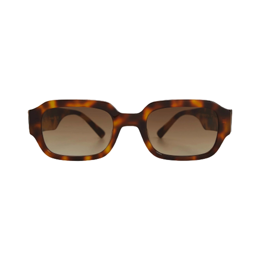 The Downey sunglasses by Messyweekend feature a unisex tortoise-shell rectangular design with brown lenses, crafted from an elegant acetate frame, and displayed against a black backdrop. These sunglasses ensure optimal eye safety with UV400 protection.