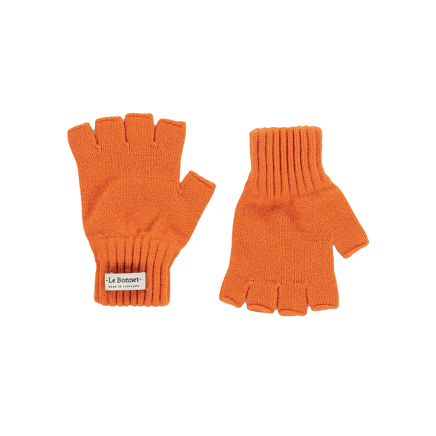 Displayed on a white background are a pair of orange fingerless knit gloves, skillfully crafted from premium Merino wool. The left glove proudly bears a label with the brand name "Le Bonnet," celebrated for its high-quality cold weather accessories made in Scotland.