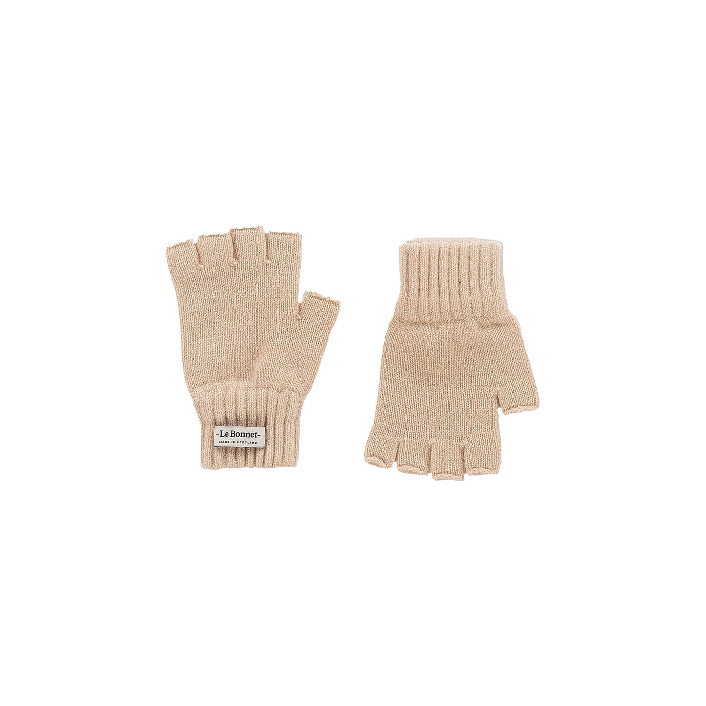 These Merino wool beige fingerless gloves by Le Bonnet feature ribbed cuffs and a label on one glove. Expertly crafted in Scotland, they offer elegance and warmth.