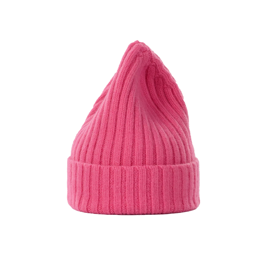 A large, bright pink ribbed knit beanie hat from Le Bonnet, made from luxurious lambswool with a chunkier texture and a pointed top, set against a plain background.