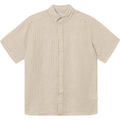 A Kris Linen SS Shirt in Light Desert Sand/Light Ivory by Les Deux displayed against a white background.