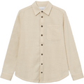 Beige corduroy shirt with a collar, button front, and a single chest pocket, crafted from recycled fibers by Les Deux, displayed on a plain background.