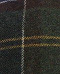 Close-up of the Heidi Tartan Sports Hat by Barbour, showcasing a woven textile with a plaid pattern in green, yellow, and brown hues that evoke the classic Barbour heritage.