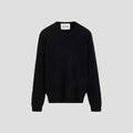 The Aiayu Leonardo Cashmere Sweater, a unisex black crew neck, stands out against a gray background and is ideal for any genderless wardrobe.