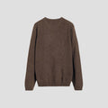 The Leonardo Cashmere Sweater by Aiayu is a unisex, brown wool piece with long sleeves and a round neckline, crafted in a plain knit pattern. Perfect for any genderless wardrobe.