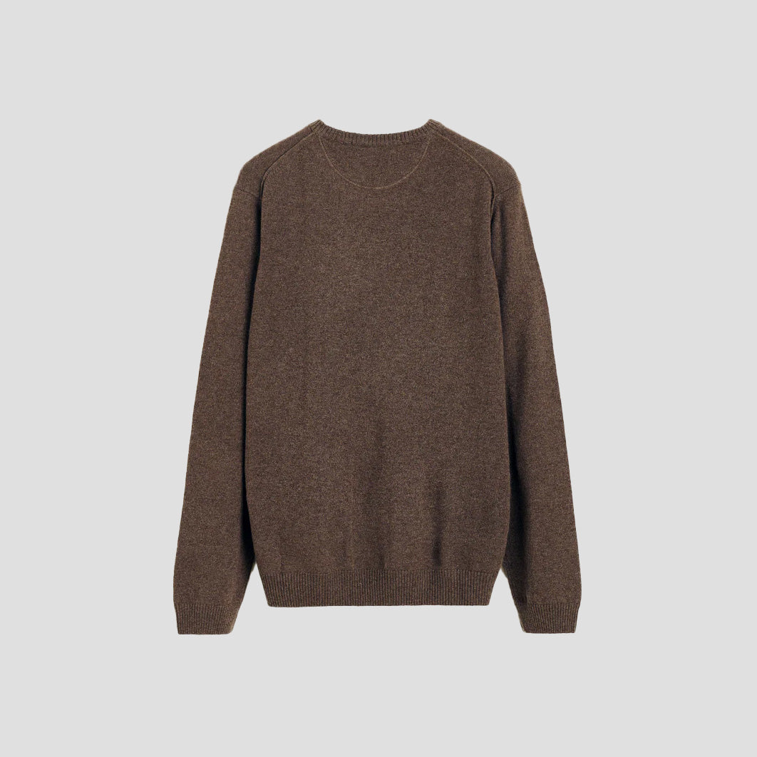 The Leonardo Cashmere Sweater by Aiayu is a unisex, brown wool piece with long sleeves and a round neckline, crafted in a plain knit pattern. Perfect for any genderless wardrobe.