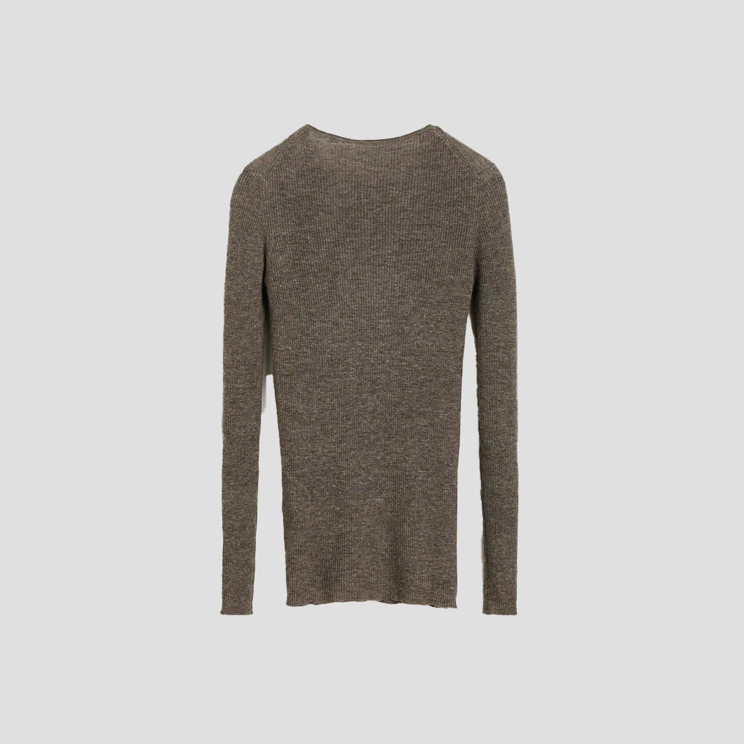 The Madigan Ribbed Cashmere LS from Aiayu, crafted in a luxurious cashmere and linen blend, is elegantly photographed against a light gray background, showcasing its ribbed texture from the back for a sophisticated touch.