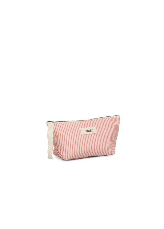 The Letto Pouch Mini by Aiayu is a small rectangular zippered pouch crafted from organic cotton, featuring a pink and white classic stripe pattern and a beige handle on one side. Perfect for travel essentials, the label on the front reads "abazu.