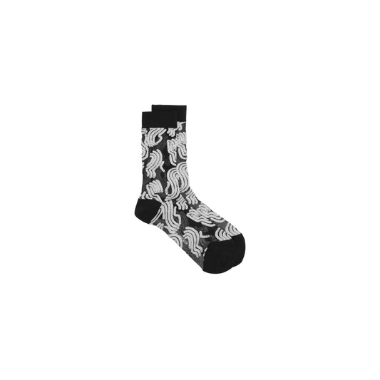 Sunny Fingers Transparent Socks Femme by Henrik Vibskov, featuring black socks with a white wavy line pattern, shown on a plain white background.