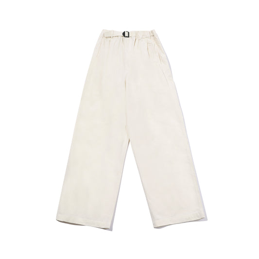 The Two Tuck Wide Pants by Kappy are unisex, high-waisted, beige cotton pants with wide legs, minimalist style, pleated details, a black buckle belt, and designed in one size that fits most.