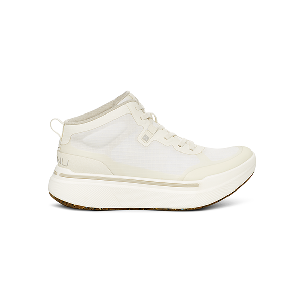 The AHNU M Sequence Mid in White is a sleek mid-top sneaker with a thick sole, lace-up closure, and back loop. Its minimal design is enhanced by rocker geometry for smoother strides.