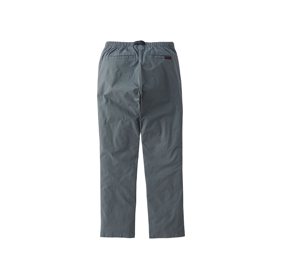 Gramicci's Weather NN-Pant in Charcoal features an elastic waistband and back pocket, shown from behind on a white background.