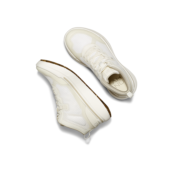 Two M Sequence Mid sneakers by AHNU, in white with rocker geometry, shown diagonally on a plain background for sleek top and side views.