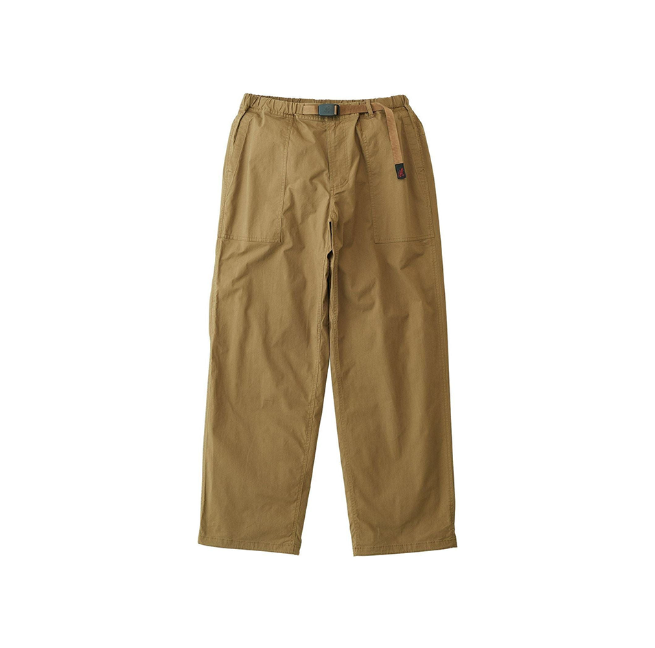 Gramicci's Weather Fatigue Pants in Coyote feature a loose fit, elastic waistband, and two large front pockets, making them perfect for outdoor wear.