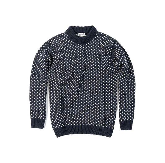 The Nordsjo Crew Neck by Devold is a navy knitted sweater made from Norwegian wool, featuring white polka dots and ribbed collar, cuffs, and hem. Designed for a unisex fit, it serves as an ideal mid-layering piece when laid flat on a white background.