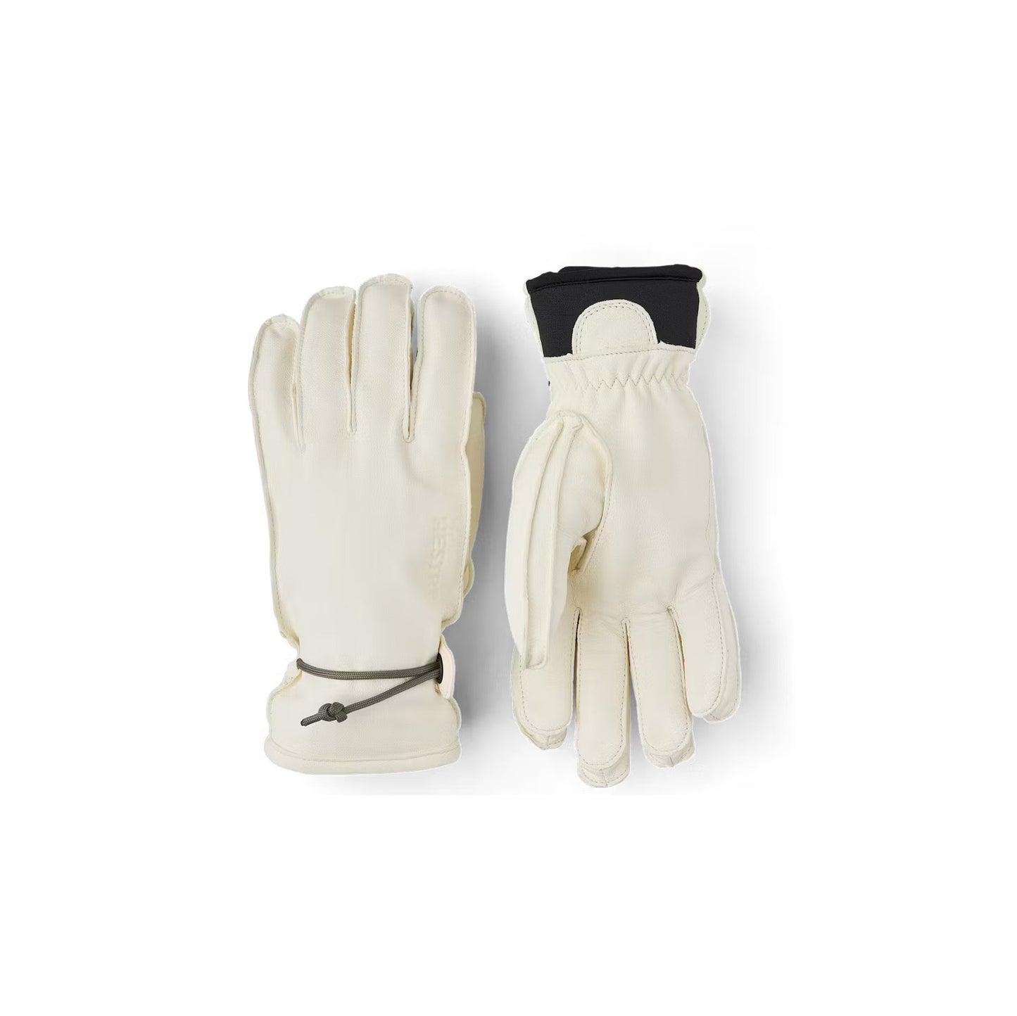 A pair of Hestra Wakayama gloves in Almond/White with black cuffs, laid side by side on a white background.