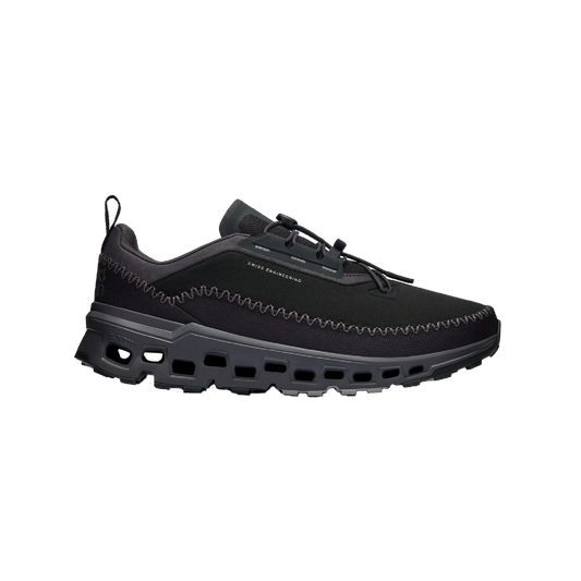 Introducing the Women's Cloudaway 2 by On Running: a black adventure shoe boasting a low-top design with a textured sole and zigzag stitch details on the upper. Its ultra-sticky Missiongrip™ outsole guarantees excellent traction, while the water-repellent finish ensures preparedness for any journey.