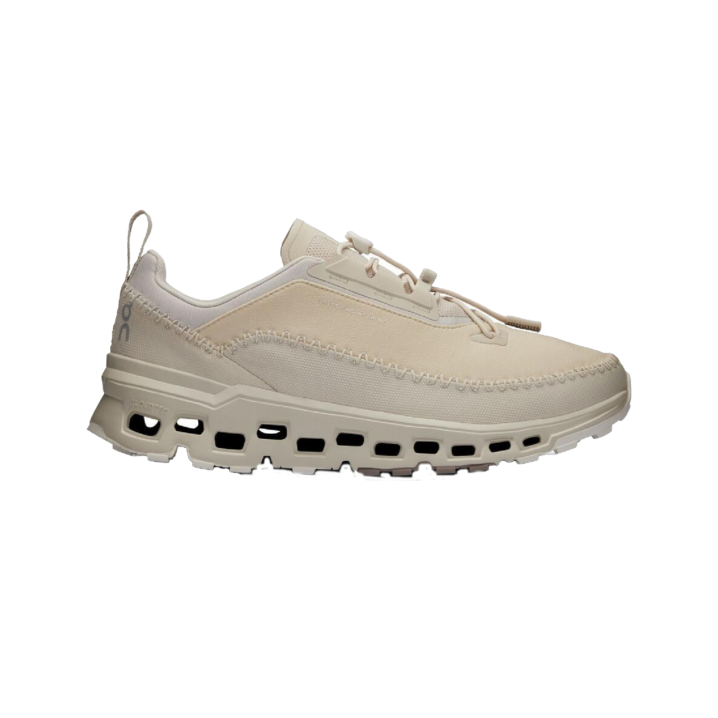 Introducing the Women's Cloudaway 2 by On Running: a beige adventure shoe featuring a perforated sole design and an ultra-sticky Missiongrip™ outsole, complete with a convenient pull tab at the heel, all showcased on a transparent background.