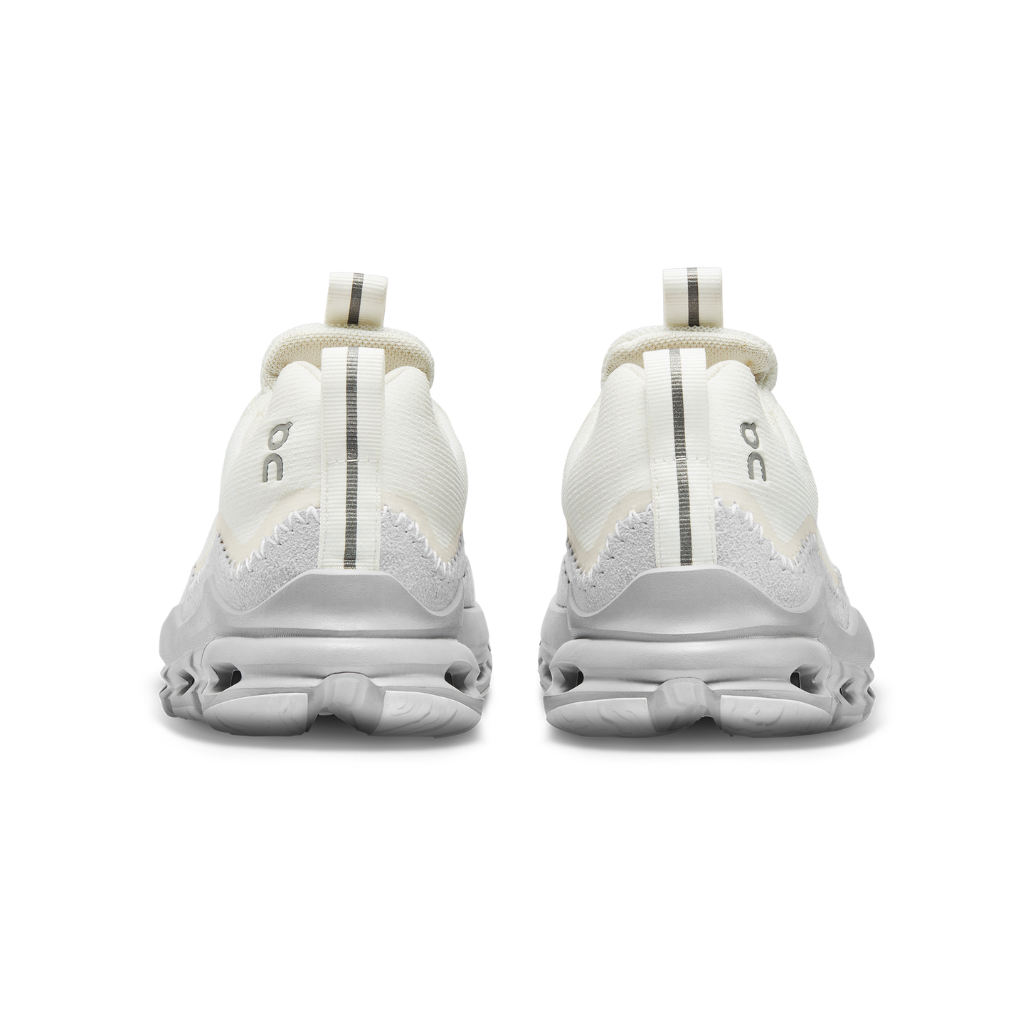 Back view of the Women's Cloudaway by On Running, showcasing a textured sole and heel pull tabs, complete with an ultra-lightweight mesh design. These white running shoes are a travel essential for comfort seekers.