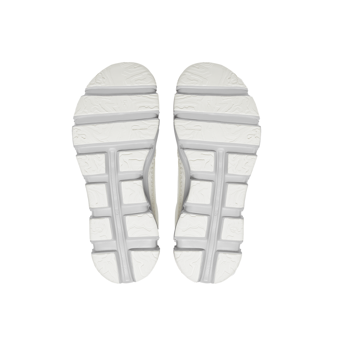 The image highlights the soles of the Women's Cloudaway shoes by On Running, featuring a white textured pattern, gray horizontal grooves, and an ultra-lightweight mesh design ideal for travel essentials.