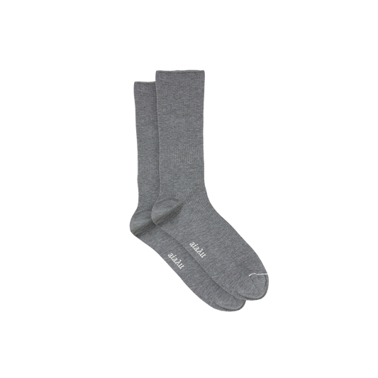 Two gray Aiayu Cotton Rib Socks, crafted from GOTS-certified organic cotton, feature "2basic" on the soles and are laid side by side against a plain backdrop.