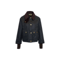 The Women's Cropped Beadnell Waxed Jacket by Barbour is a dark green, short tailored jacket with a brown collar and cuffs. It features front pockets and gold buttons.