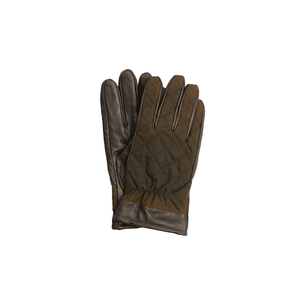 The Barbour M Dalegarth Gloves are displayed. With their brown Nappa leather construction, quilted design, and meticulous stitching details, these sleek accessories exude elegance.