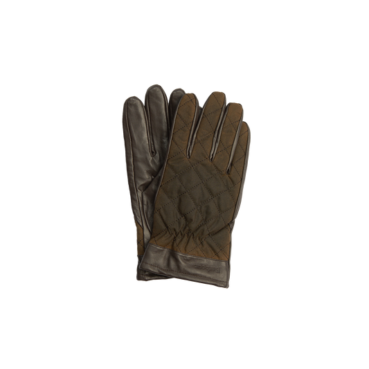 The Barbour M Dalegarth Gloves are displayed. With their brown Nappa leather construction, quilted design, and meticulous stitching details, these sleek accessories exude elegance.