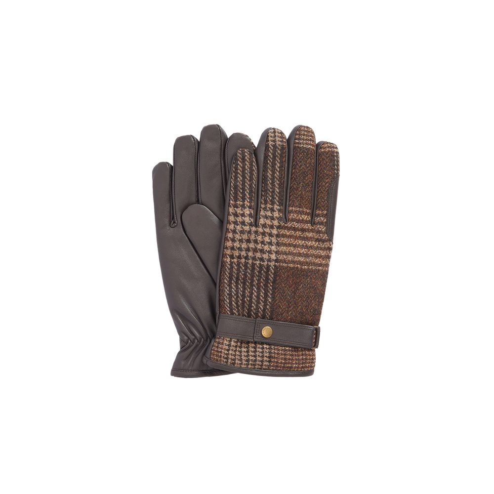 A pair of Barbour Deveron Tweed Gloves featuring brown leather with a houndstooth pattern on the back and a button detail at the wrist.