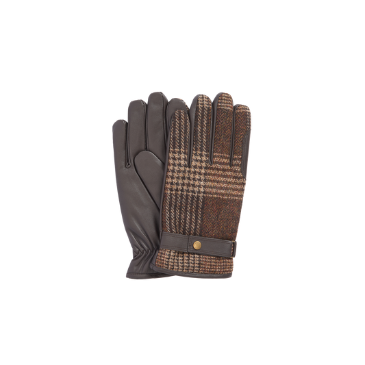 A pair of Barbour Deveron Tweed Gloves featuring brown leather with a houndstooth pattern on the back and a button detail at the wrist.