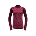 Devold's W Kvitegga Cross Neck in Beetroot is a women's long-sleeve top with a dark pink floral pattern on the front.