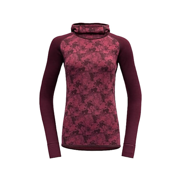 Discover the W Kvitegga Hoodie by Devold, Beetroot edition. This versatile long-sleeve athletic top is crafted from soft Merino wool with a stylish high-neck design. It's reversible, providing two looks in one to complement your active lifestyle.