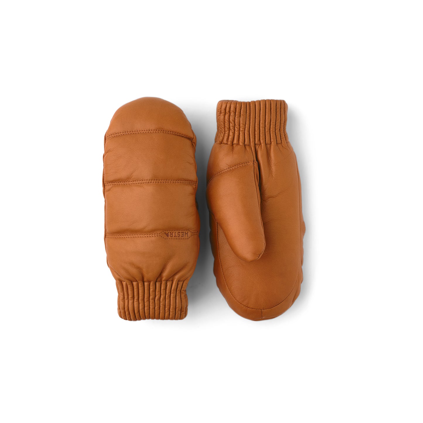 A pair of Hestra Valdres Mitten in cork, crafted from brown lamp nappa leather with Primaloft Gold insulation, displayed with one palm up and one palm down on a white background. Unisex and versatile.