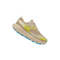 The Hoka W Stinson ATR 6, DOTN is a versatile running shoe in beige and yellow with blue soles, featuring the brand logo on the side for all-day comfort.