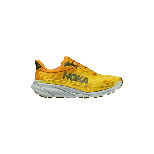 The M Challenger ATR 7 in Passionfruit/Golden Yellow offers a cushioned sole and "Hoka" branding, delivering enhanced traction for an all-terrain experience.