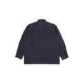 Back view of an iconic design—a Jungle Jacket in dark blue with long sleeves and buttoned cuffs—crafted from recycled polyester by Universal Works, laid flat on a white background.