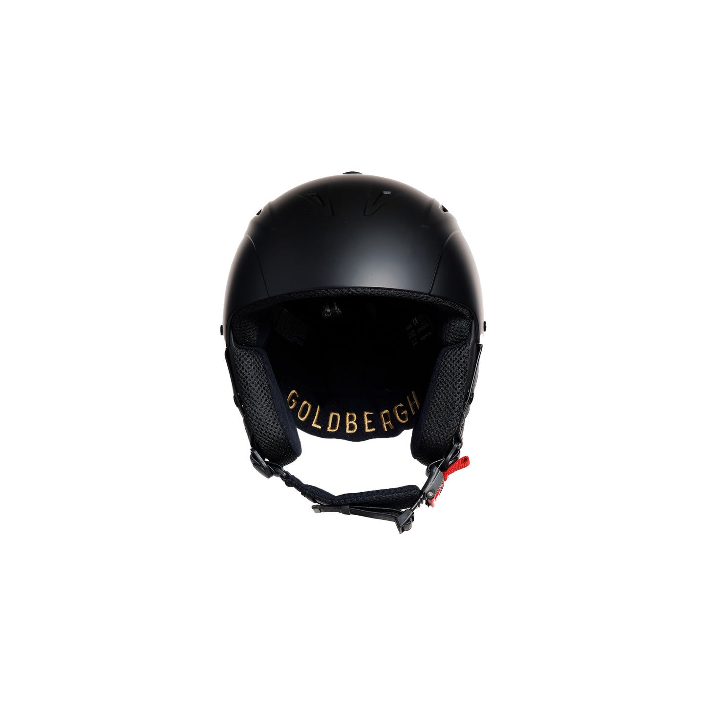 The Khloe Helmet by Goldbergh is black and features the brand name in gold letters on the back, along with a chin strap equipped with a red buckle.